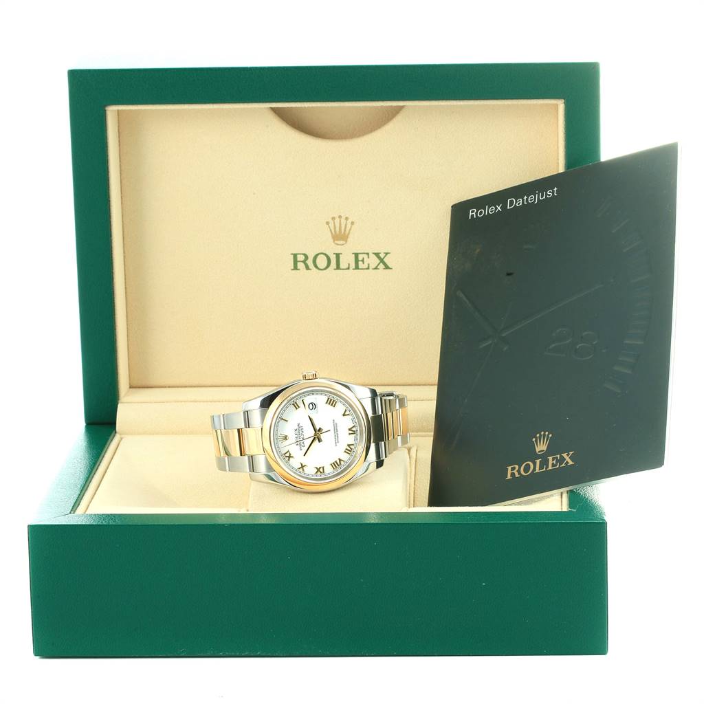 The Rolex Datejust 116203 Men's Stainless Steel White Dial 116203 Men's Stainless Steel White Dial watch is displayed frontally in its green box, accompanied by a booklet.