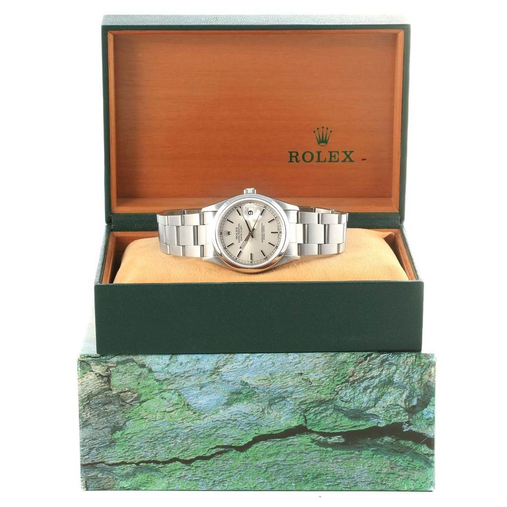 The Rolex Datejust 16220 Men's Stainless Steel Silver Dial 16220 Men's Stainless Steel Silver Dial watch is displayed front-on, inside an open Rolex box with both the dial and bracelet visible.