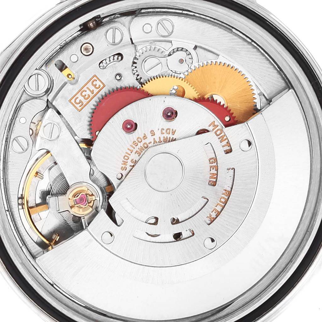 This image shows the internal mechanical movement and intricate gears of a Rolex Datejust 16220 Men's Stainless Steel Silver Dial 16220 Men's Stainless Steel Silver Dial watch from a close-up angle.