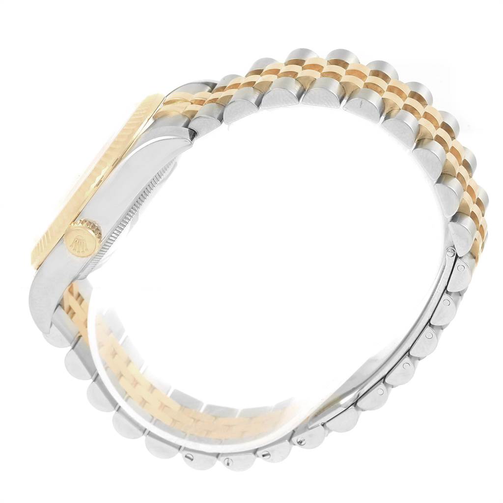 The image shows a side view of the Rolex Datejust 116233 Stainless Steel Beige Dial 116233 Stainless Steel Beige Dial watch, highlighting its two-tone metal bracelet and crown.