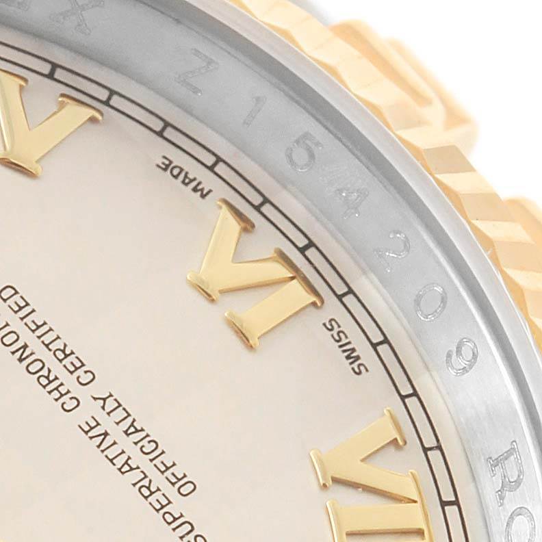 This close-up image of a Rolex Datejust 116233 Stainless Steel Beige Dial 116233 Stainless Steel Beige Dial watch shows the dial with Roman numerals, part of the bezel, and "SWISS MADE" marking.