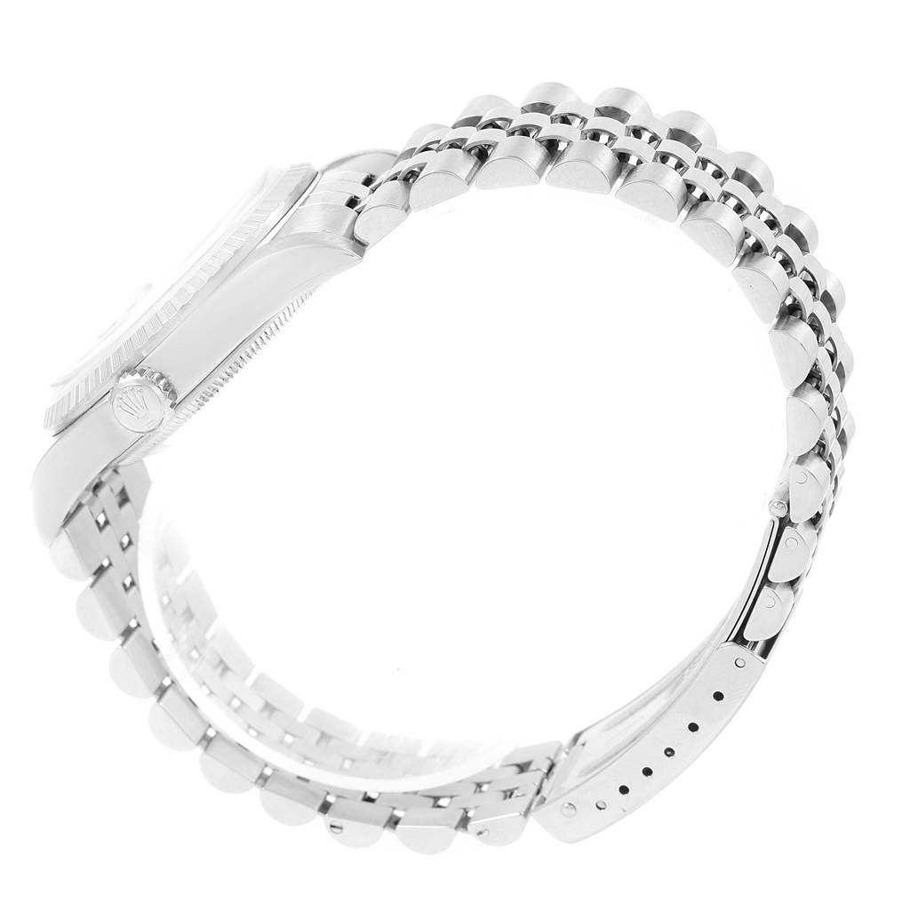 This image shows a side view of a Rolex Datejust 16220 Men's Stainless Steel White Dial 16220 Men's Stainless Steel White Dial watch highlighting its case and jubilee bracelet.