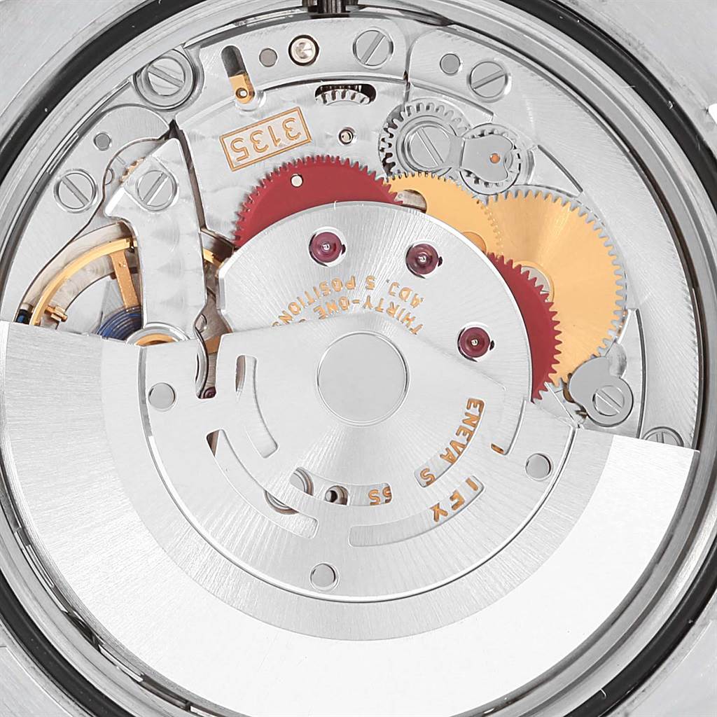 This image shows a close-up view of the movement mechanism inside a Rolex Datejust 116200 Men's Stainless Steel White Dial 116200 Men's Stainless Steel White Dial watch.