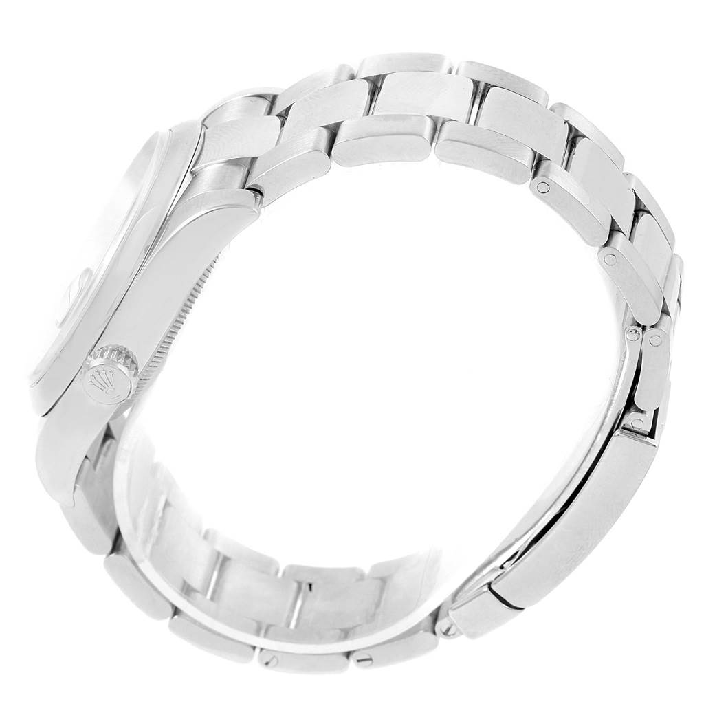 This image shows a side view of the Rolex Datejust 116200 Men's Stainless Steel White Dial 116200 Men's Stainless Steel White Dial watch focusing on the bracelet and crown.