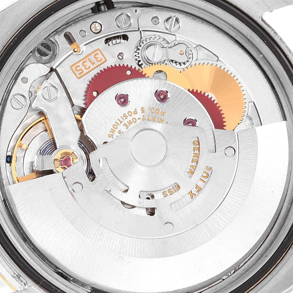 The image shows the internal mechanical movement of a Rolex Datejust 116203 Stainless Steel Champagne Dial 116203 Stainless Steel Champagne Dial watch, viewed from the back.