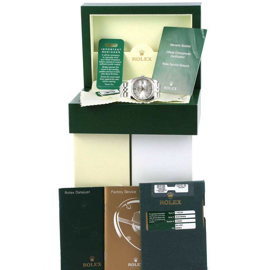 The image shows a Rolex Datejust 116234 Men's Stainless Steel Silver Dial 116234 Men's Stainless Steel Silver Dial watch with its box, warranty booklet, chronometer certification, and additional manuals.