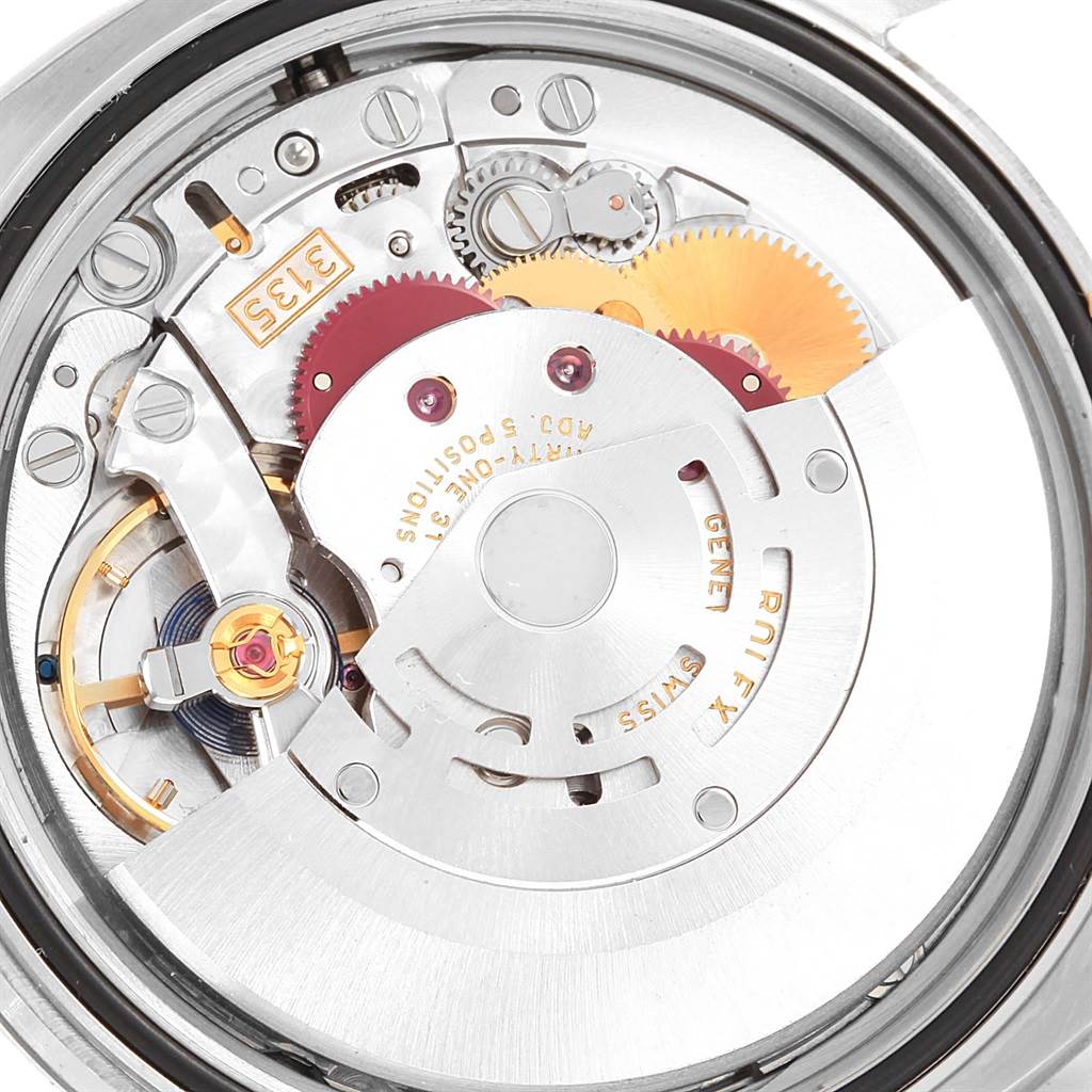 The image shows the internal mechanics of the Rolex Datejust 116234 Men's Stainless Steel Silver Dial 116234 Men's Stainless Steel Silver Dial, including gears and movement components, viewed from the back.