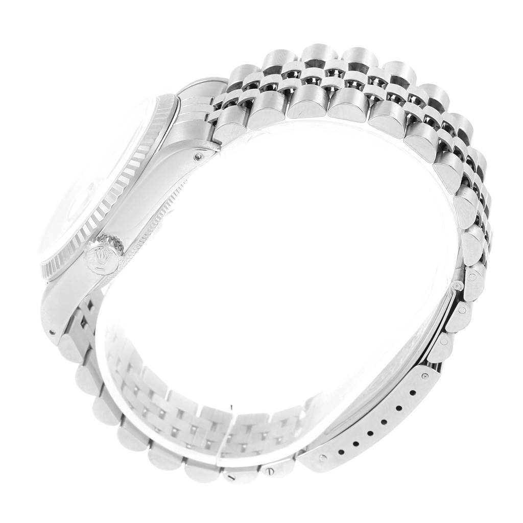 This image shows a side view of a Rolex Datejust 16234 Men's Stainless Steel White Dial 16234 Men's Stainless Steel White Dial watch, highlighting the case, crown, and bracelet.