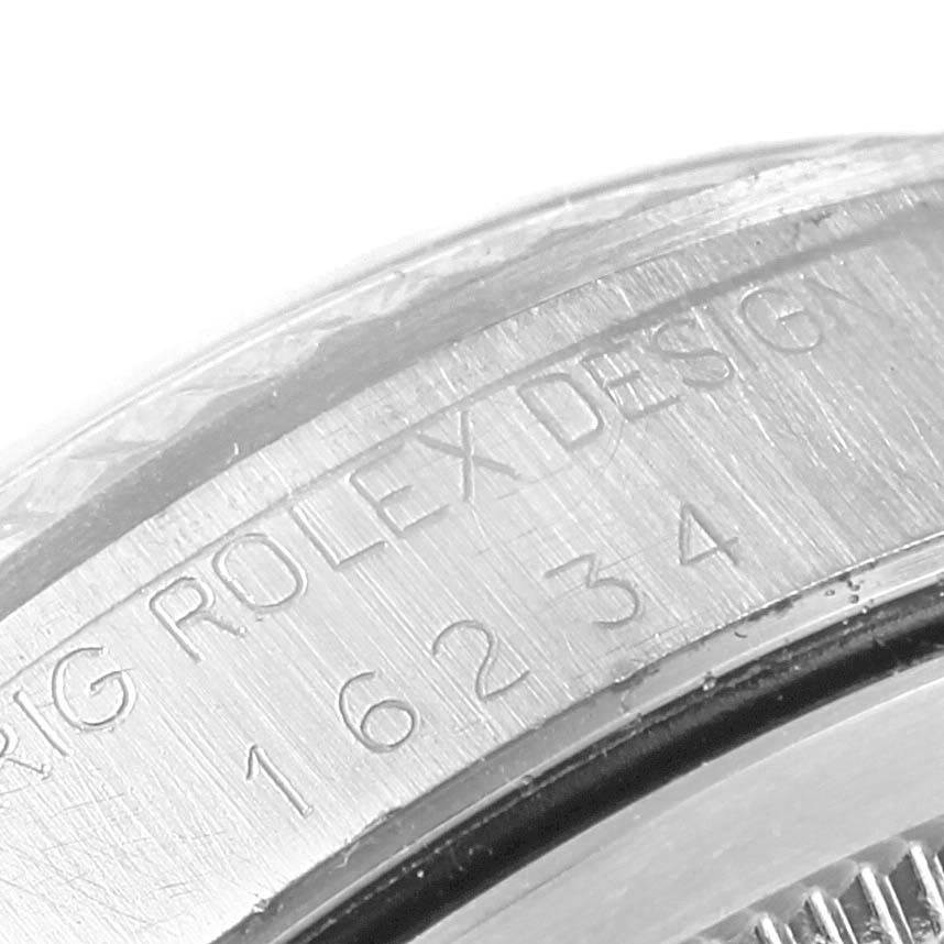 This image shows the serial and reference numbers engraved on the case side of a Rolex Datejust 16234 Stainless Steel White Dial 16234 Stainless Steel White Dial watch.