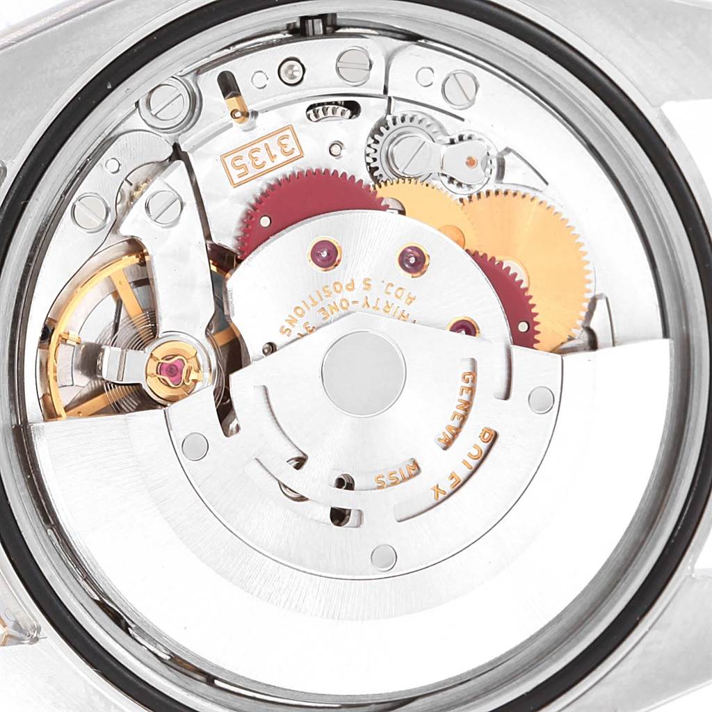 This image shows the inner mechanical movement of a Rolex Datejust 116203 Stainless Steel Mother of Pearl Dial 116203 Stainless Steel Mother of Pearl Dial from a back perspective, highlighting gears and mechanisms.