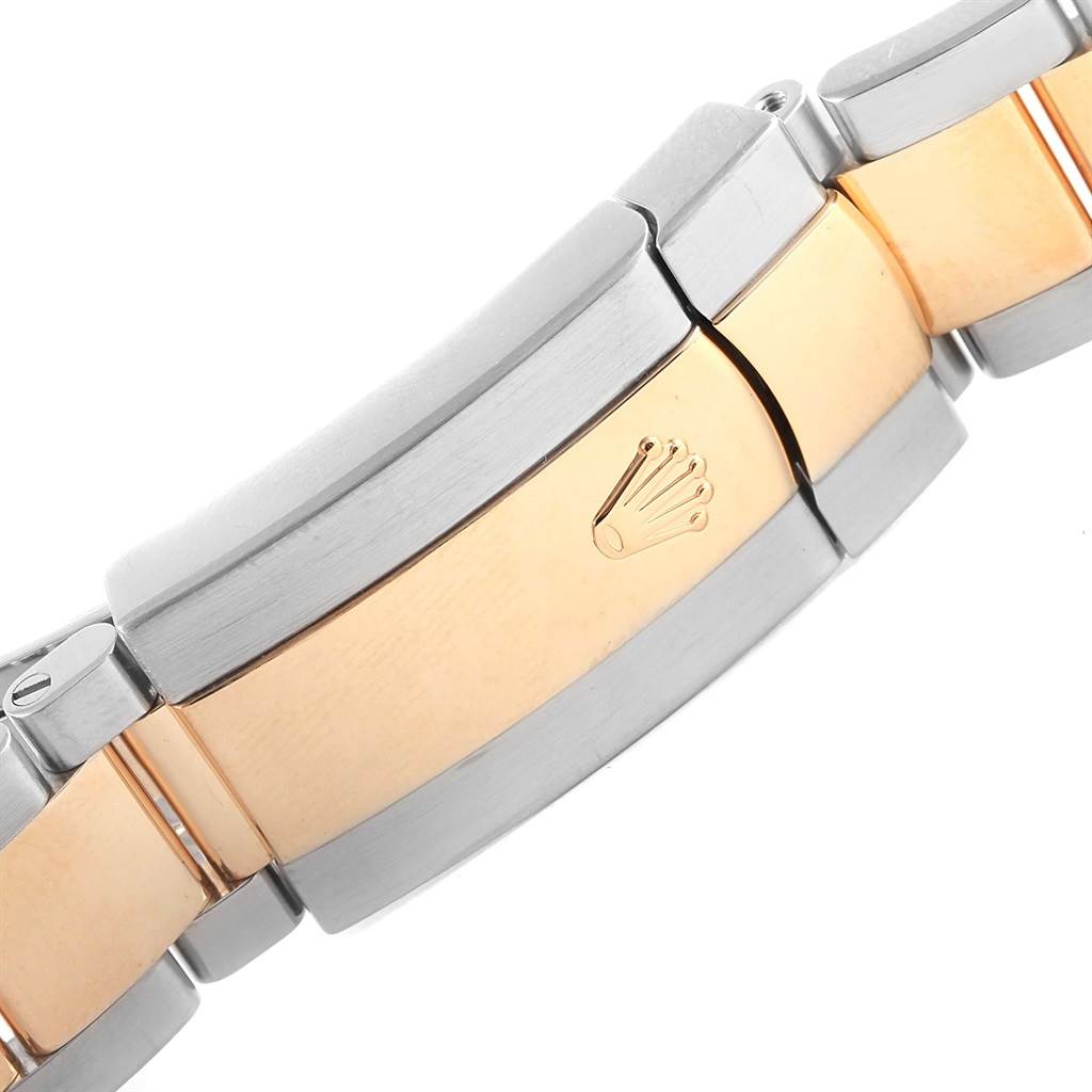 The image shows a close-up of the clasp of a Rolex Datejust 116203 Stainless Steel Mother of Pearl Dial 116203 Stainless Steel Mother of Pearl Dial watch, highlighting the two-tone bracelet.