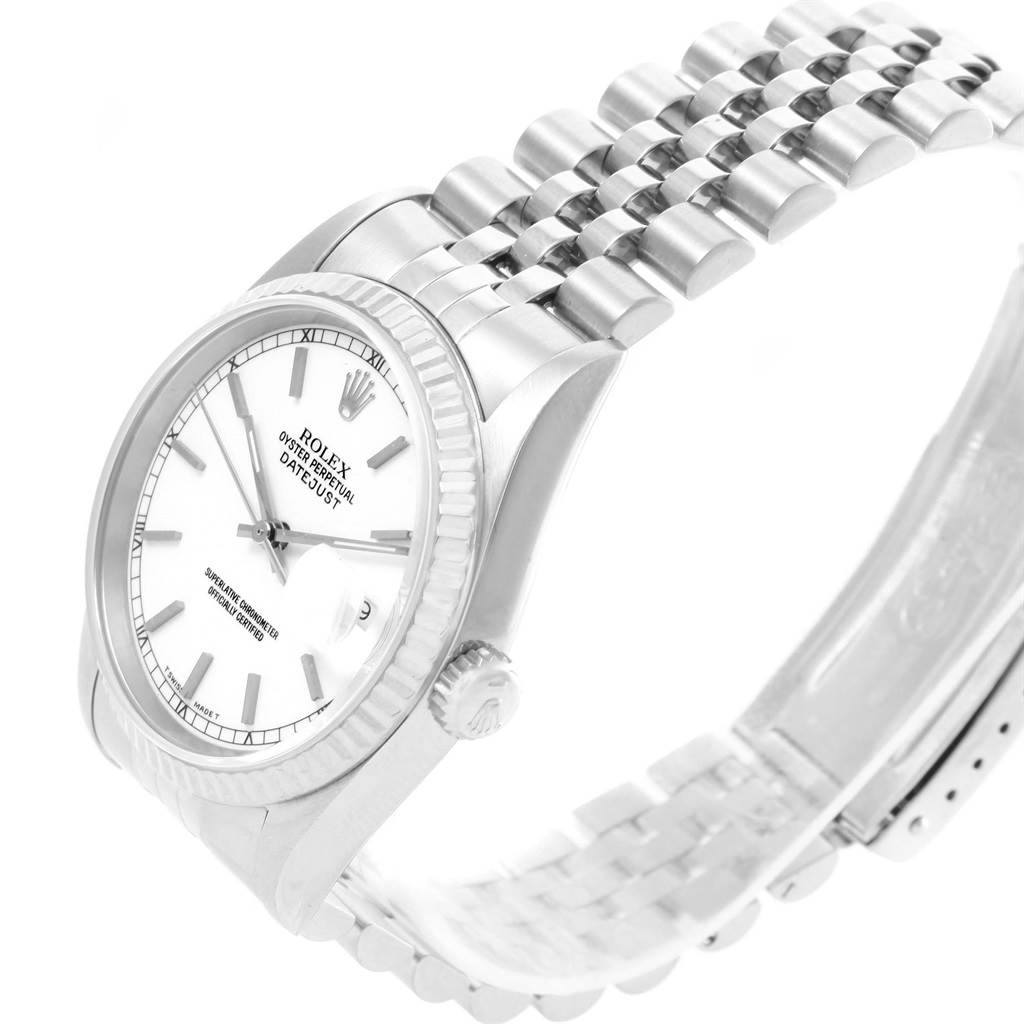 This image shows a side angle of the Rolex Datejust 16234 Men's Stainless Steel White Dial 16234 Men's Stainless Steel White Dial watch, highlighting the white dial, fluted bezel, and Jubilee bracelet.