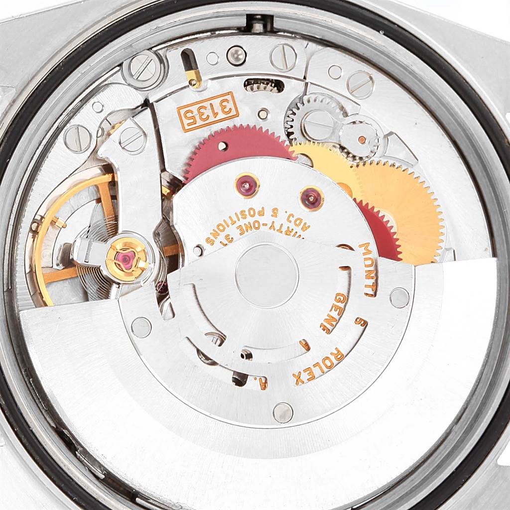 This image shows a close-up view of the Rolex Datejust 16234 Men's Stainless Steel White Dial 16234 Men's Stainless Steel White Dial model's movement and internal mechanism.