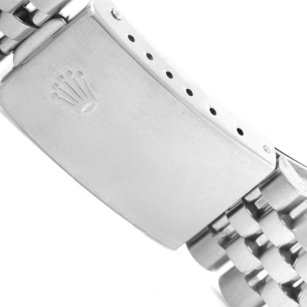 The image shows the clasp and part of the bracelet of a Rolex Datejust 16234 Men's Stainless Steel White Dial 16234 Men's Stainless Steel White Dial watch, viewed from a side angle.