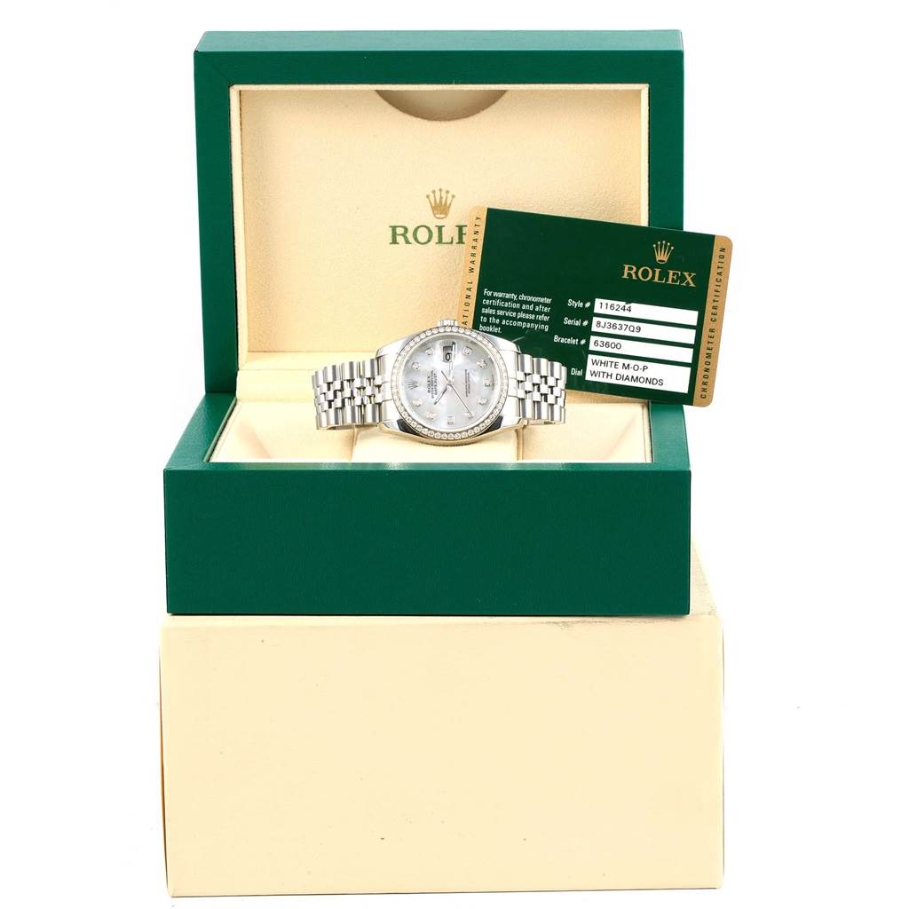 The Rolex Datejust 116244 Stainless Steel Mother of Pearl Dial 116244 Stainless Steel Mother of Pearl Dial watch is displayed front-facing in an open green box with a certificate card in the background.
