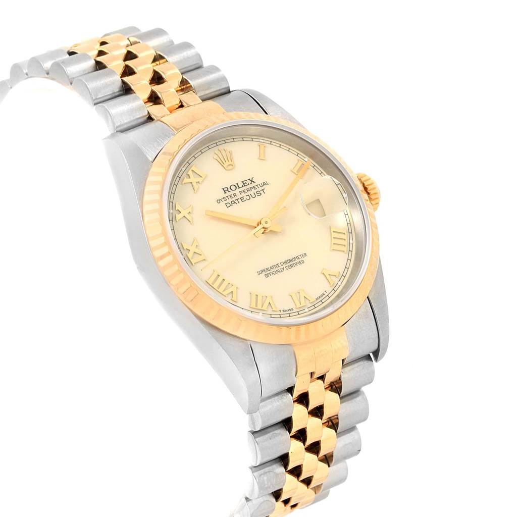 This image shows a Rolex Datejust 16233 Men's Steel and Gold (two tone) Beige Dial 16233 Men's Steel and Gold (two tone) Beige Dial watch at a slight angle, displaying the dial, bezel, and a portion of the bracelet.
