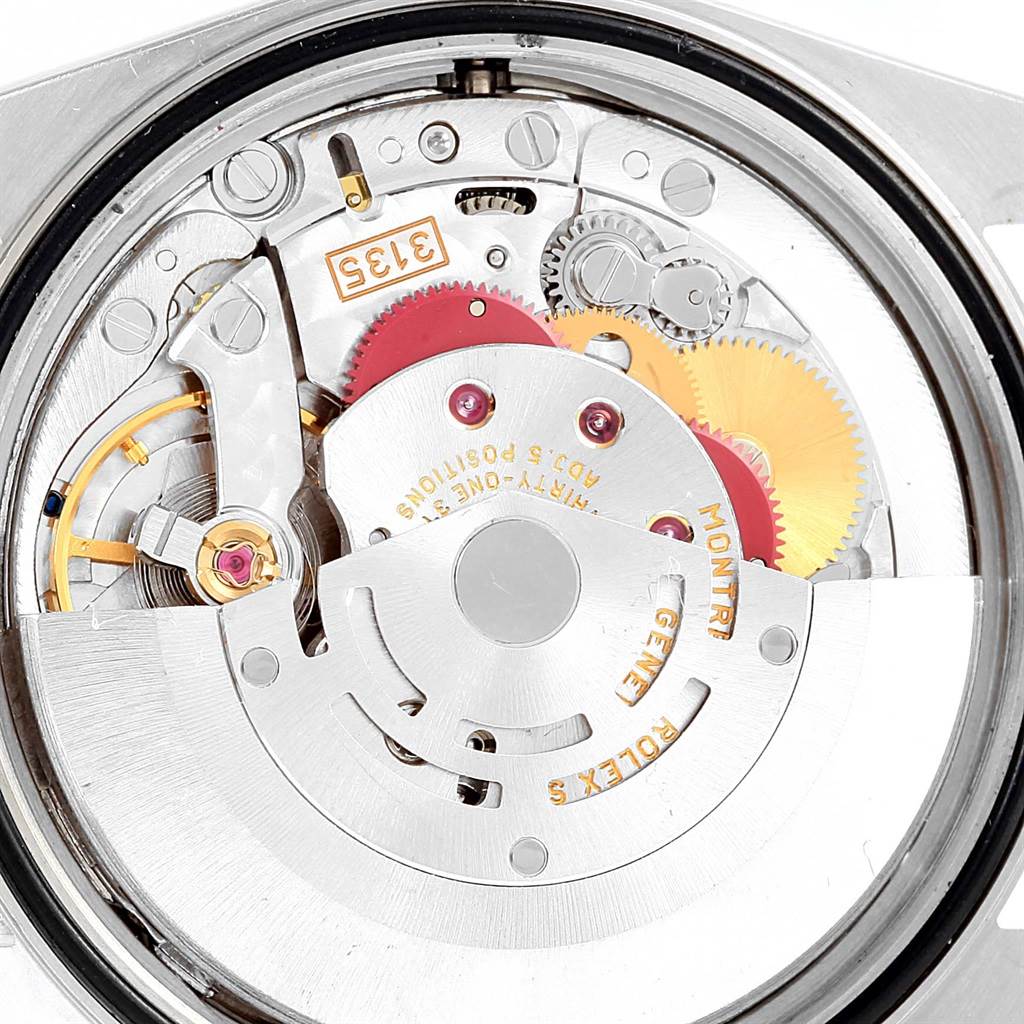 This image shows the intricate internal movement mechanism of the Rolex Datejust 16233 Men's Steel and Gold (two tone) Beige Dial 16233 Men's Steel and Gold (two tone) Beige Dial watch.
