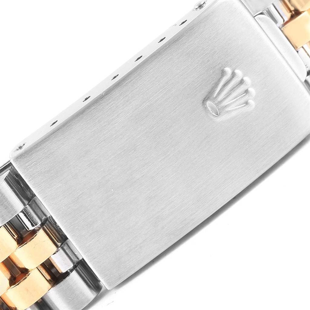 This image shows the clasp and part of the bracelet of a Rolex Datejust 16233 Men's Steel and Gold (two tone) Beige Dial 16233 Men's Steel and Gold (two tone) Beige Dial watch.