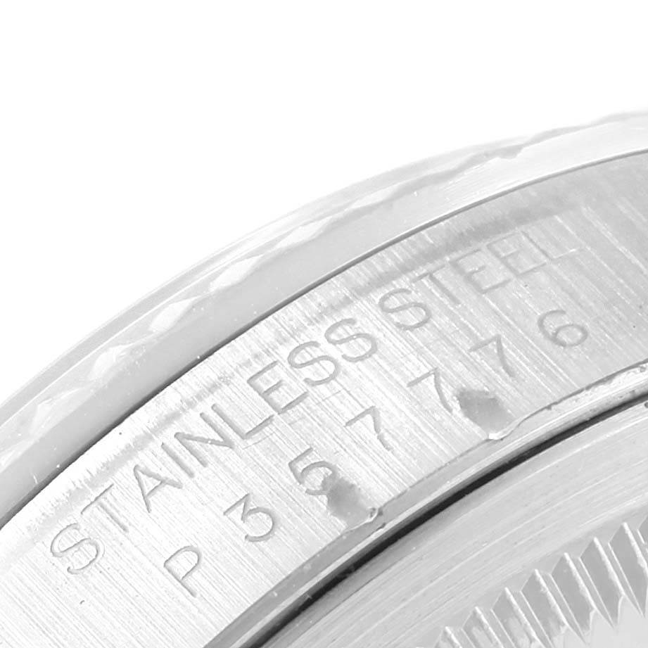 This close-up image shows the stainless steel case back with the serial number of a Rolex Datejust 16234 Men's Stainless Steel White Dial 16234 Men's Stainless Steel White Dial watch.