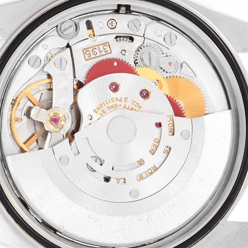 The image shows the internal mechanism and movement of a Rolex Datejust 16233 Men's Steel and Gold (two tone) Silver Dial 16233 Men's Steel and Gold (two tone) Silver Dial watch, viewed from the back.