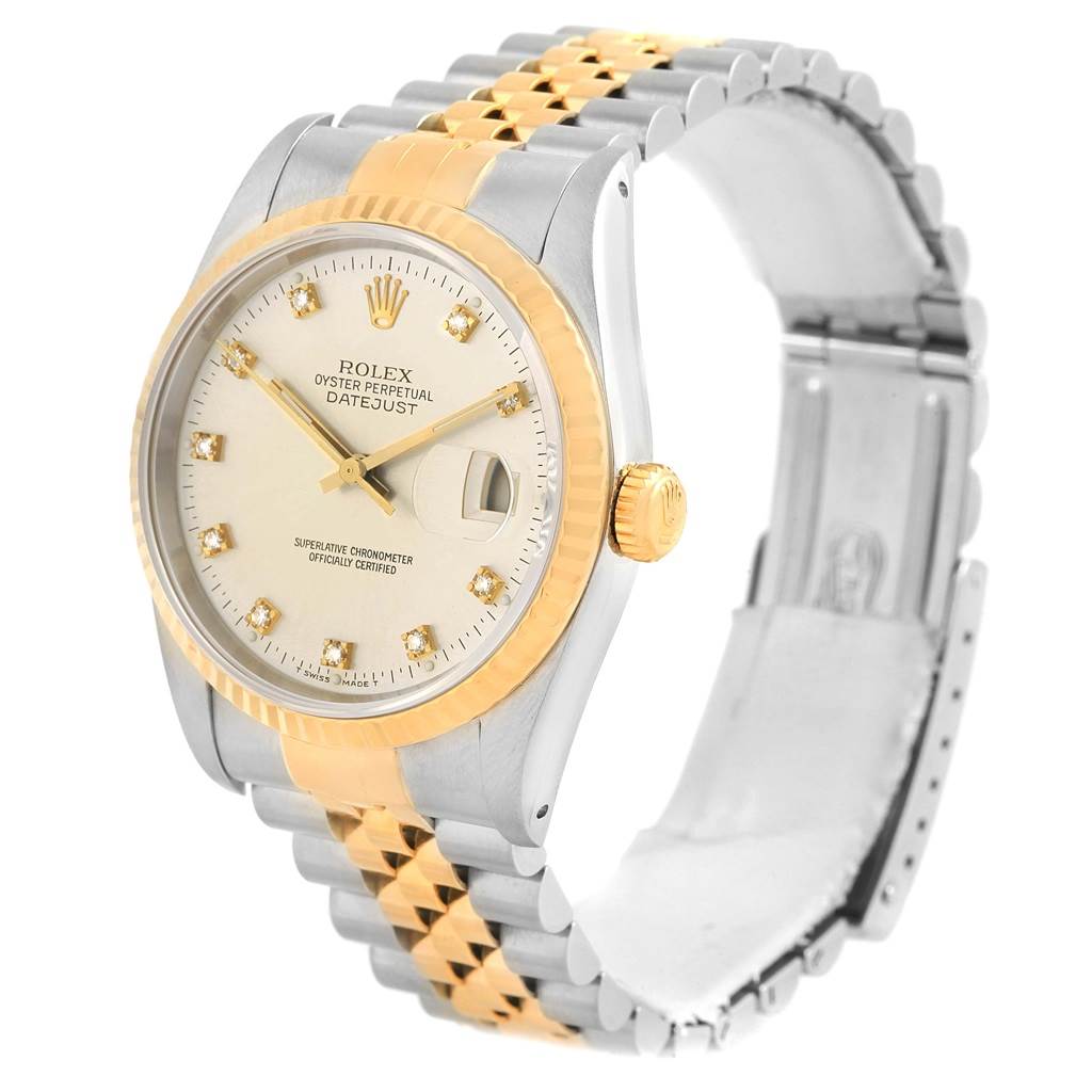 The image shows a Rolex Datejust 16233 Men's Steel and Gold (two tone) Silver Dial 16233 Men's Steel and Gold (two tone) Silver Dial watch at a three-quarter angle, highlighting its dial, bezel, crown, and partially open two-tone bracelet.