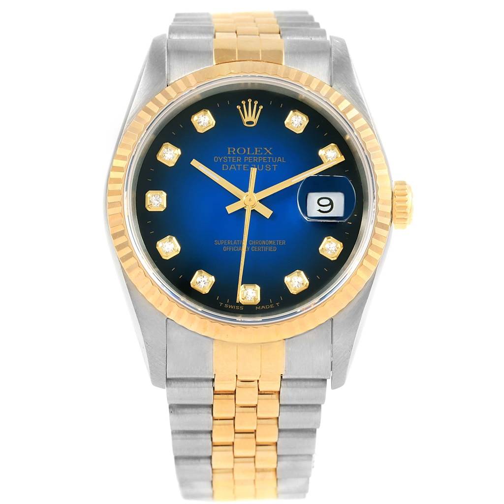 The image shows a Rolex Datejust 16233 Steel and Gold (two tone) Blue Dial 16233 Steel and Gold (two tone) Blue Dial watch from a front view, highlighting its blue dial, diamond hour markers, and two-tone bracelet.