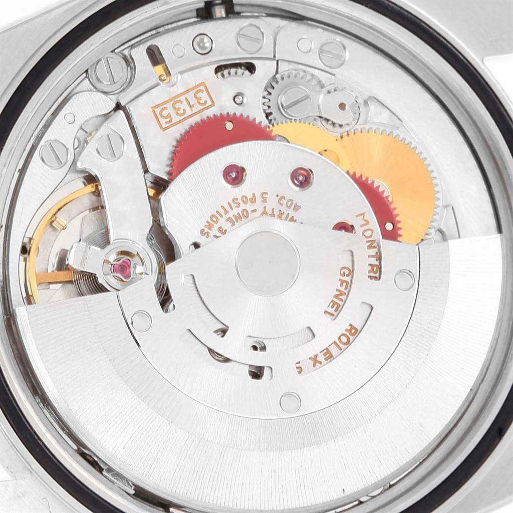 The image shows the intricate internal mechanism of a Rolex Datejust 16233 Steel and Gold (two tone) Blue Dial 16233 Steel and Gold (two tone) Blue Dial model watch viewed from the back.