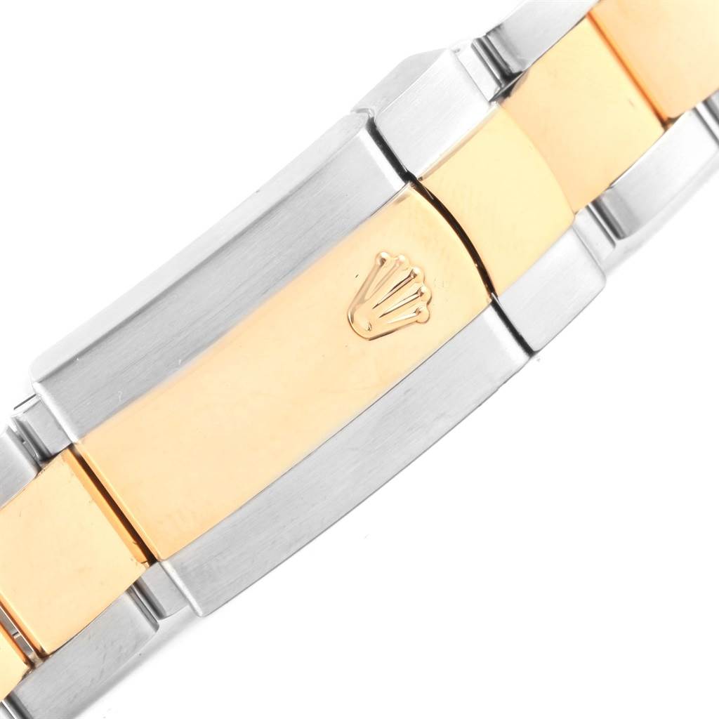 This is a close-up of the bracelet clasp on a Rolex Datejust 116233 Men's Stainless Steel Silver Dial 116233 Men's Stainless Steel Silver Dial watch, showcasing the Rolex logo.