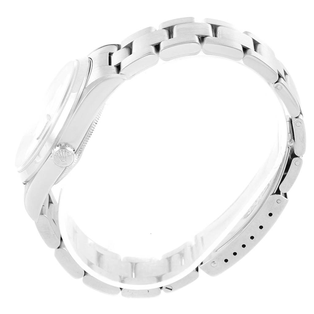 This image shows a side view of the Rolex Datejust 16200 Men's Stainless Steel White Dial 16200 Men's Stainless Steel White Dial watch, highlighting its crown and bracelet.