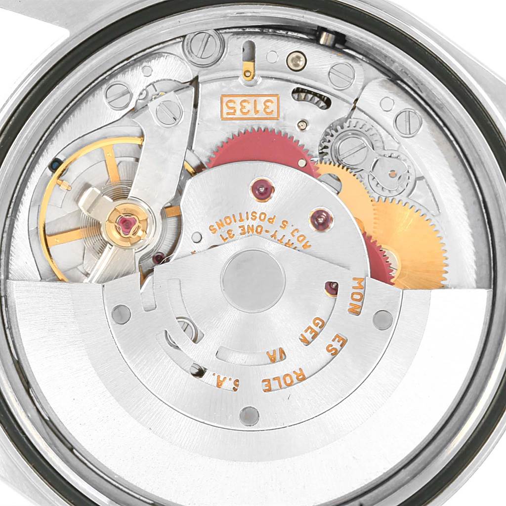 This image shows the internal mechanism of a Rolex Datejust 16200 Men's Stainless Steel White Dial 16200 Men's Stainless Steel White Dial watch from a close-up, top-down angle.
