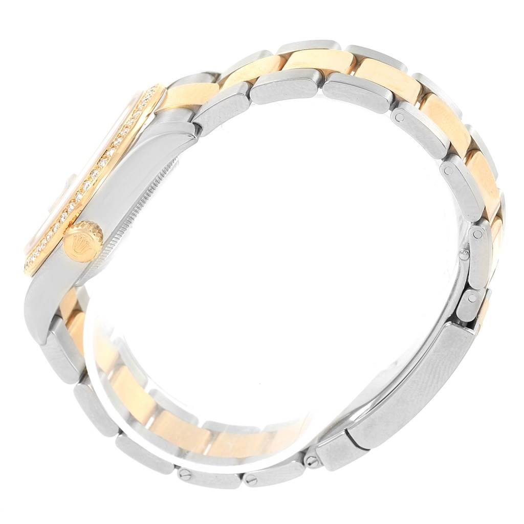 The image shows a side view of a Rolex Datejust 116243 Men
s Stainless Steel Black Dial 116243 Men
s Stainless Steel Black Dial watch, highlighting its two-tone bracelet, crown, and case.