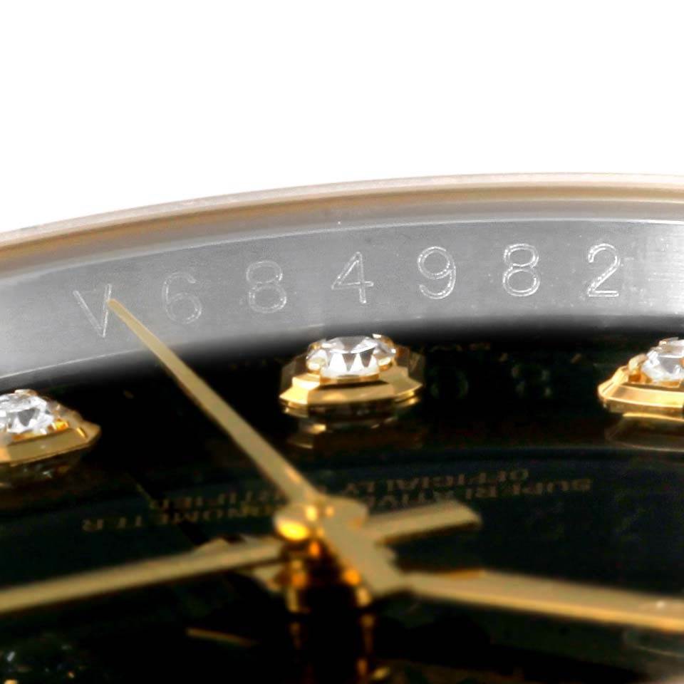 The image shows a close-up angle of the serial number and diamond markers on the dial of a Rolex Datejust 116243 Men
s Stainless Steel Black Dial 116243 Men
s Stainless Steel Black Dial watch.
