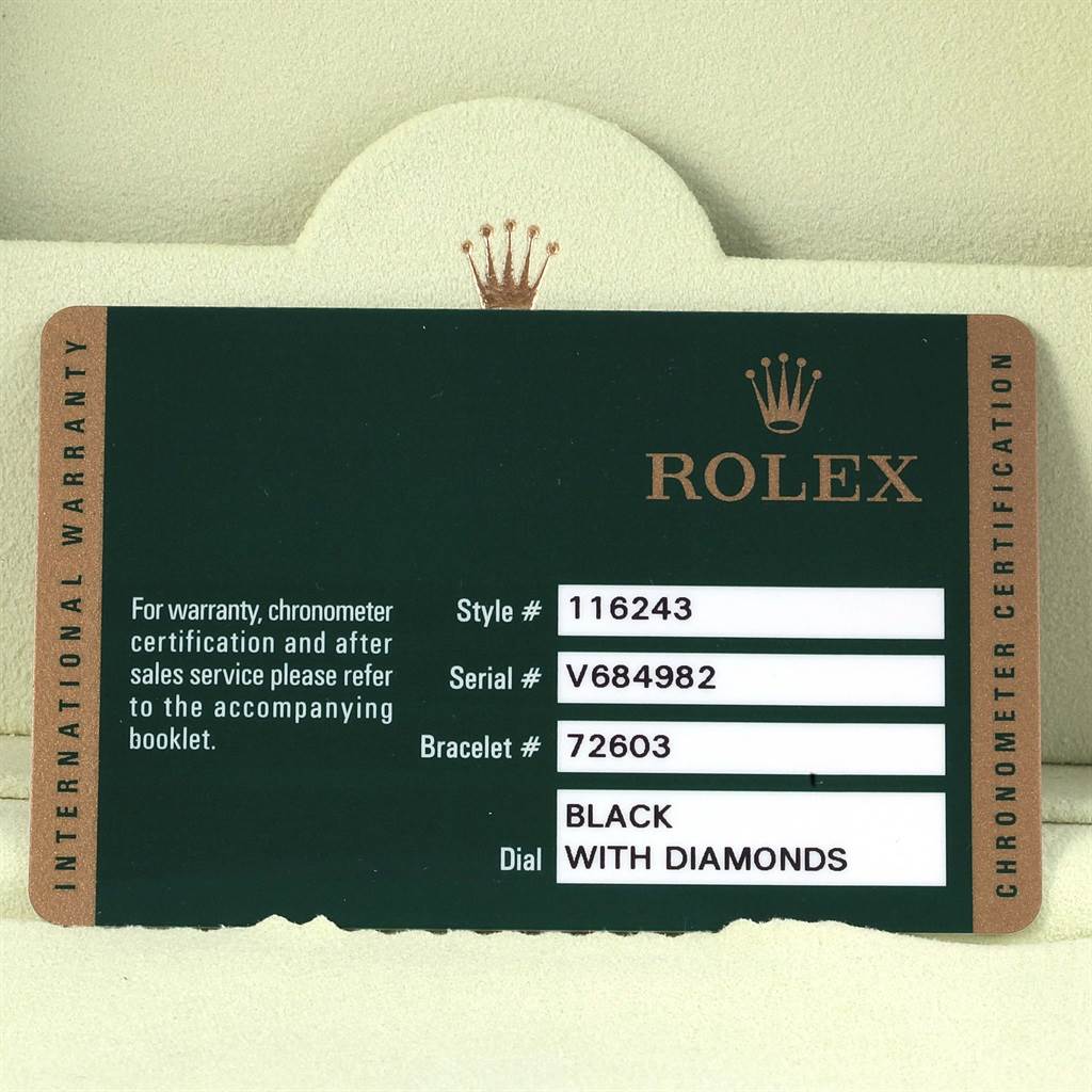 This image shows the warranty card for a Rolex Datejust 116243 Men
s Stainless Steel Black Dial 116243 Men
s Stainless Steel Black Dial model, displaying the style, serial, bracelet numbers, and dial description.