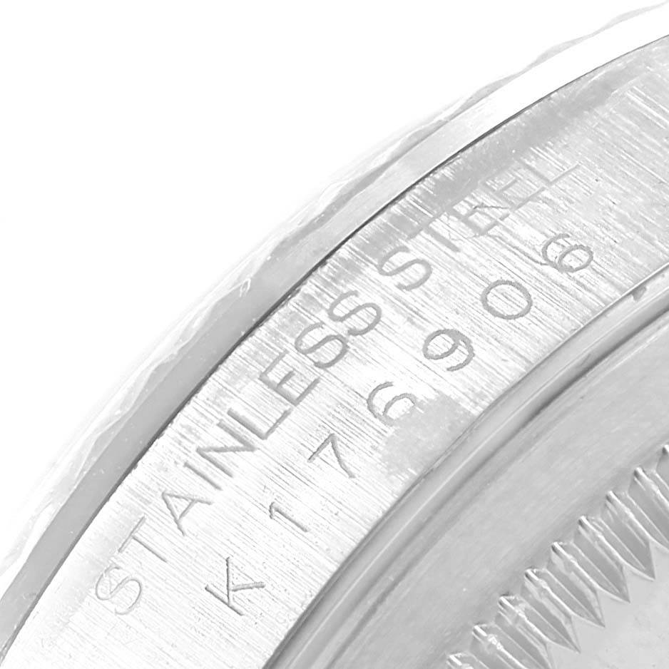 This image shows a close-up of the side of a Rolex Datejust 16234 Men's Stainless Steel Silver Dial 16234 Men's Stainless Steel Silver Dial watch, focusing on the "Stainless Steel" engraving.