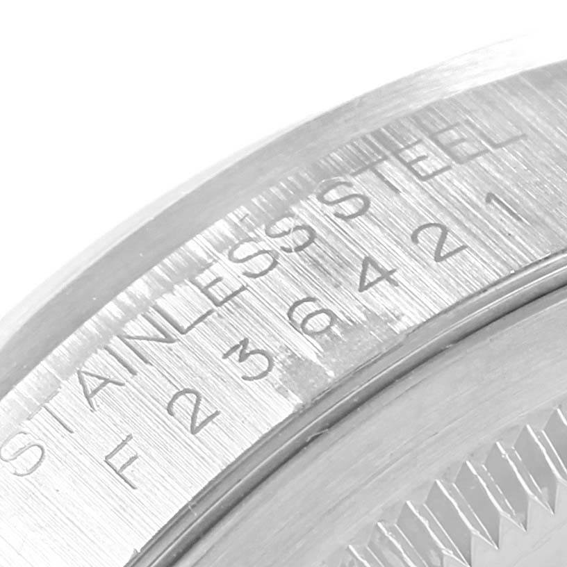 This image shows a close-up of the engraved case back or inner bezel of a Rolex Datejust 16200 Men's Stainless Steel Silver Dial 16200 Men's Stainless Steel Silver Dial watch, made of stainless steel.
