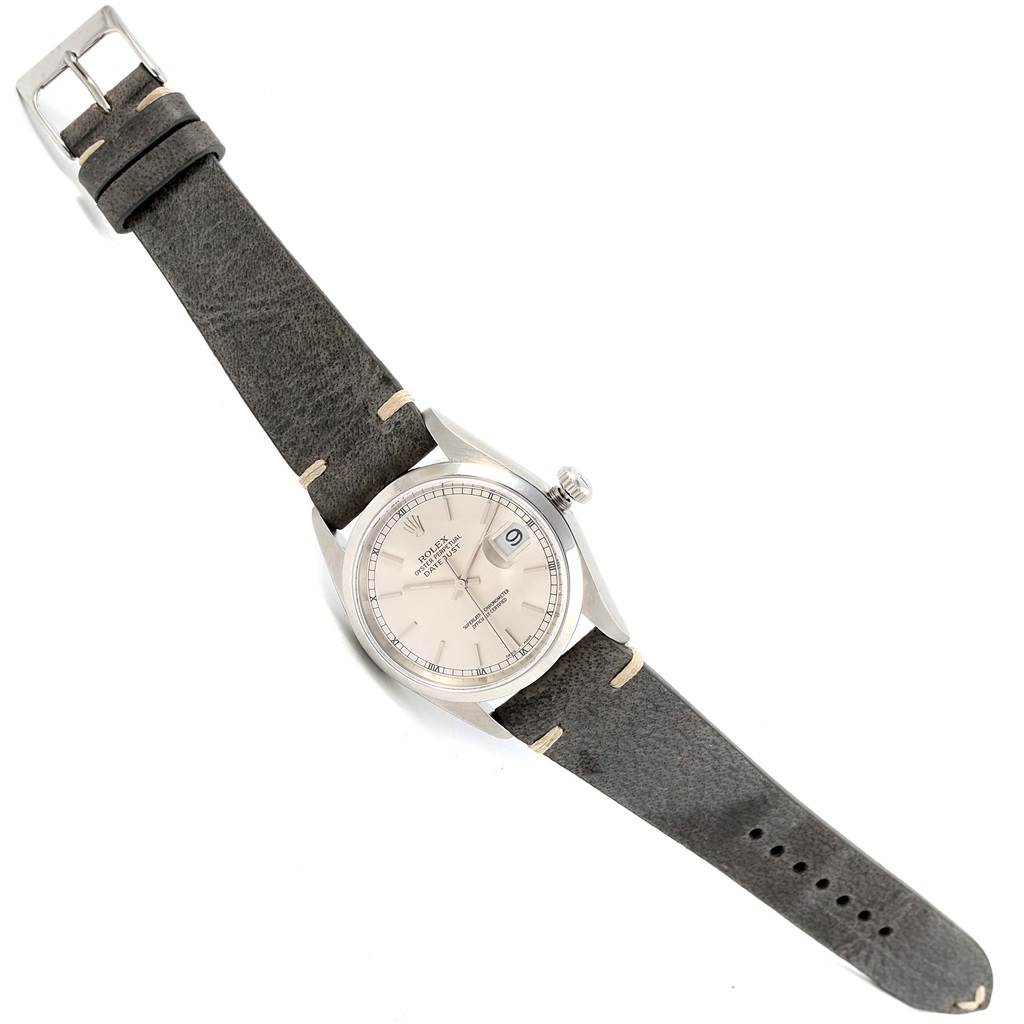 The Rolex Datejust 16200 Men's Stainless Steel Silver Dial 16200 Men's Stainless Steel Silver Dial watch is shown from above, displaying its face, bezel, crown, and strap.