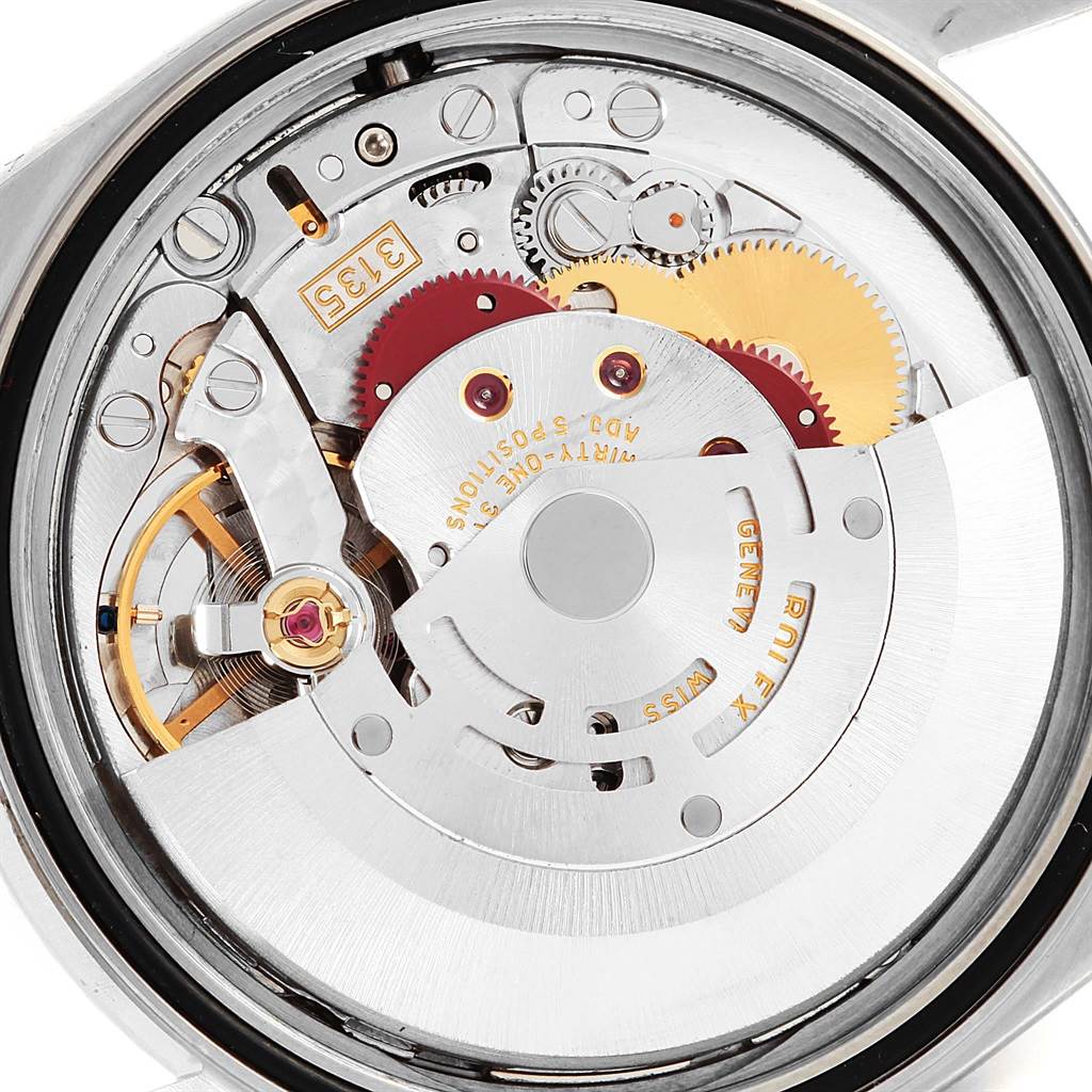 This image shows the movement and internal mechanism of a Rolex Datejust 16220 Men's Stainless Steel Silver Dial 16220 Men's Stainless Steel Silver Dial watch from the back.