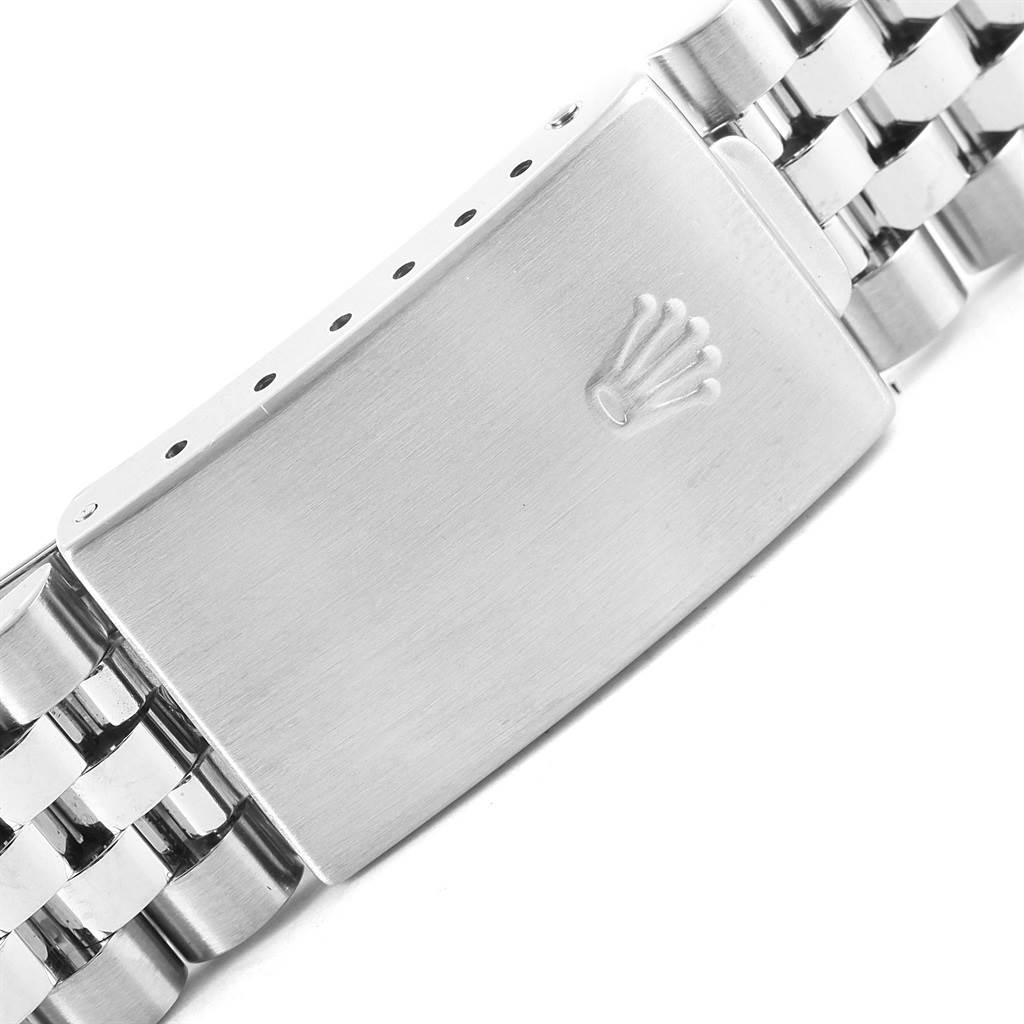 This image shows the clasp of the Rolex Datejust 16220 Men's Stainless Steel Silver Dial 16220 Men's Stainless Steel Silver Dial watch band, highlighting the Rolex logo.