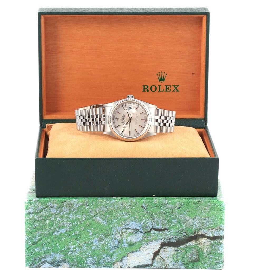 This Rolex Datejust 16220 Men's Stainless Steel Silver Dial 16220 Men's Stainless Steel Silver Dial watch is displayed front-on in its open box, highlighting the dial, bezel, and bracelet.