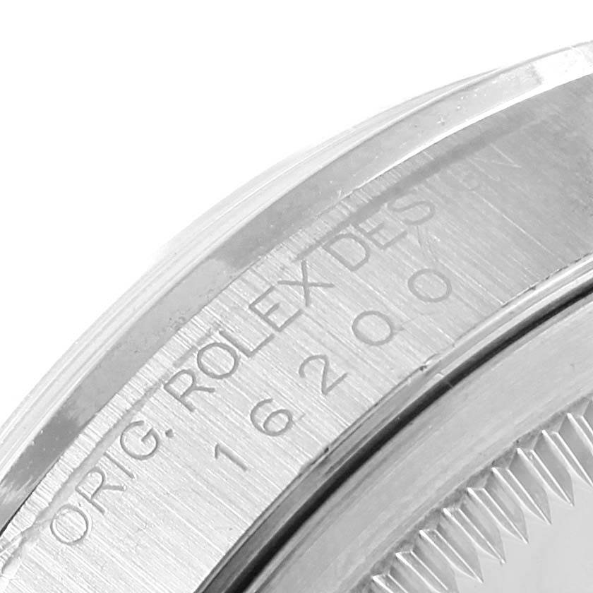 This image shows a close-up of the case and engraved model number "16200" of the Rolex Datejust 16200 Men's Stainless Steel White Dial 16200 Men's Stainless Steel White Dial watch.