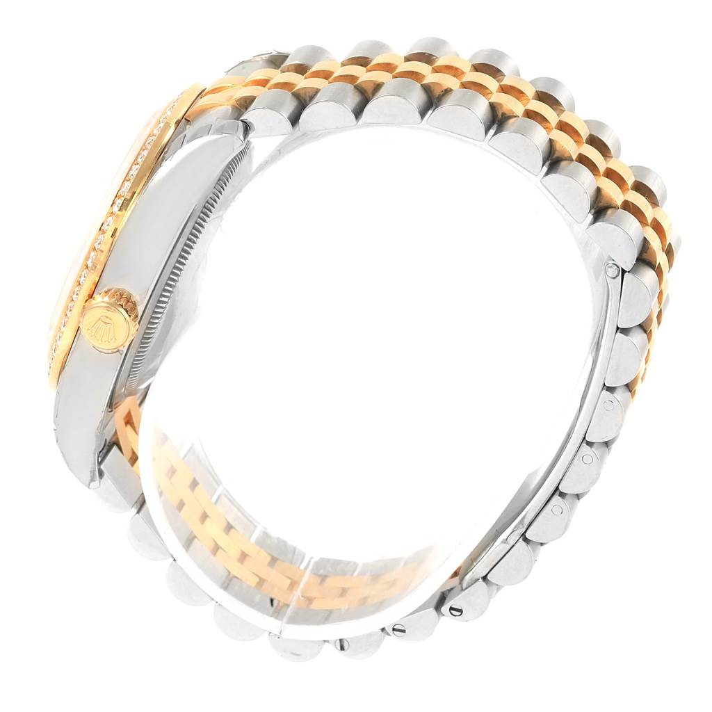 This image shows a side view of the Rolex Datejust 116243 Stainless Steel Mother of Pearl Dial 116243 Stainless Steel Mother of Pearl Dial watch, focusing on its crown, bezel, and Jubilee bracelet.