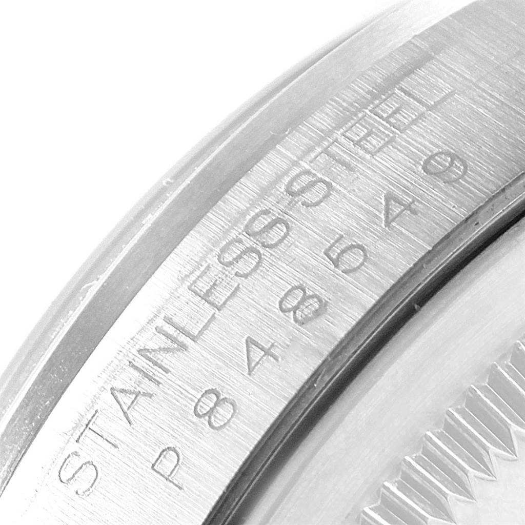 This image shows a close-up of the engravings on the stainless steel case back of a Rolex Datejust 16200 Men's Stainless Steel White Dial 16200 Men's Stainless Steel White Dial watch.