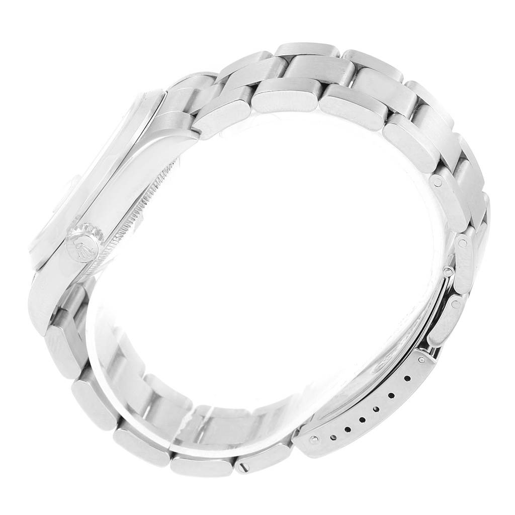 The image shows the side view of a Rolex Datejust 16200 Men's Stainless Steel White Dial 16200 Men's Stainless Steel White Dial watch, focusing on the bracelet, clasp, and side of the case.