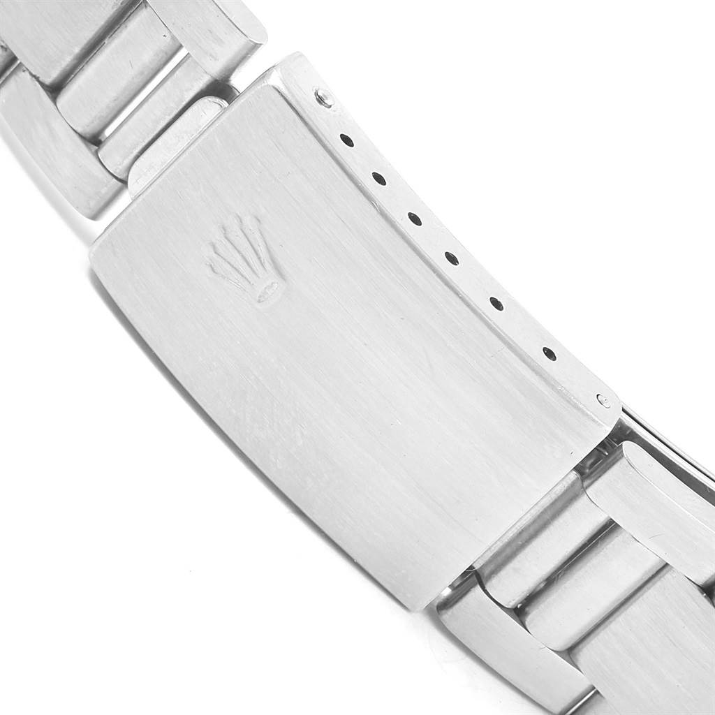 The image shows the clasp of the Rolex Datejust 16200 Men's Stainless Steel White Dial 16200 Men's Stainless Steel White Dial watch band, featuring the iconic Rolex crown logo.