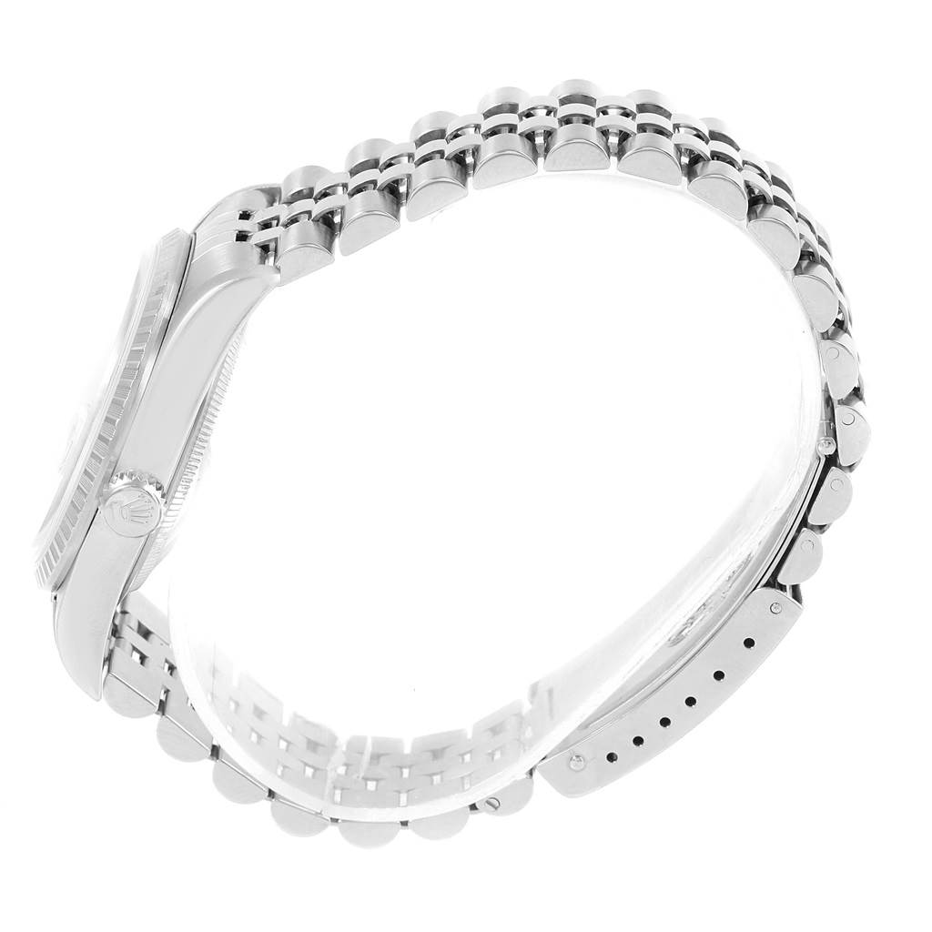 The image shows a side profile of the Rolex Datejust 16220 Men's Stainless Steel Silver Dial 16220 Men's Stainless Steel Silver Dial watch focusing on the bracelet and case.