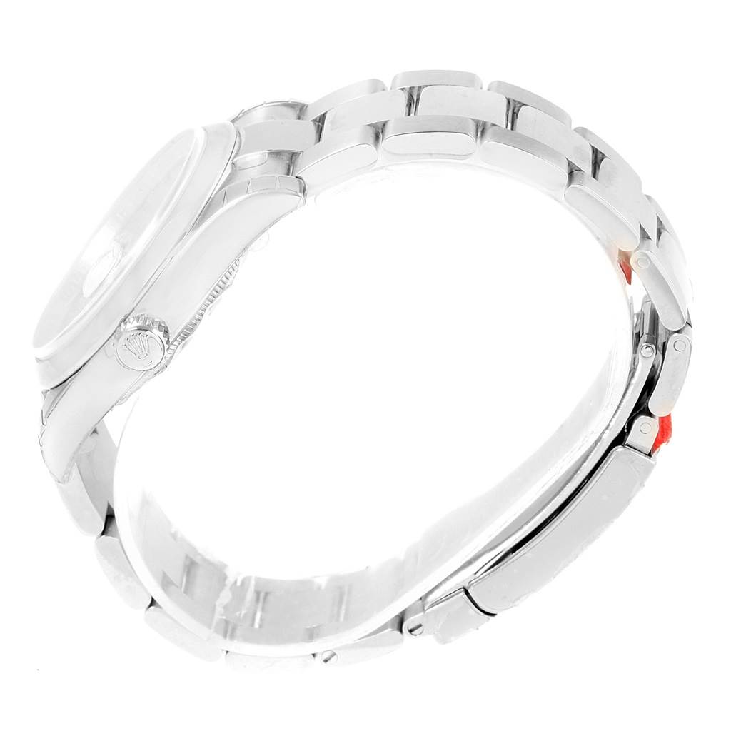 The image shows a side view of the Rolex Datejust 116200 Men's Stainless Steel Silver Dial 116200 Men's Stainless Steel Silver Dial watch displaying the bezel, crown, and bracelet.