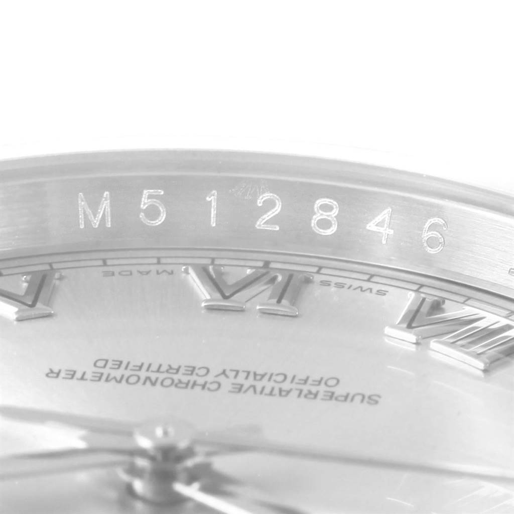 The image shows a close-up of the inner bezel and part of the dial on a Rolex Datejust 116200 Men's Stainless Steel Silver Dial 116200 Men's Stainless Steel Silver Dial watch.
