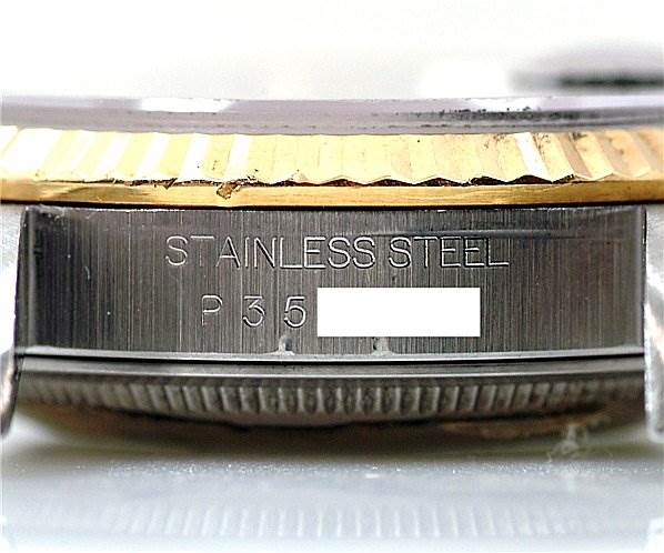 This image shows a close-up of the side view of a Rolex Datejust 16233 Men's Stainless Steel Black Dial 16233 Men's Stainless Steel Black Dial, revealing its stainless steel casing and part of the bezel.