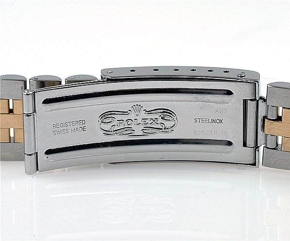 This image shows the clasp of a Rolex Datejust 16233 Men's Stainless Steel Black Dial 16233 Men's Stainless Steel Black Dial watch with branding and inscriptions on the inner part.