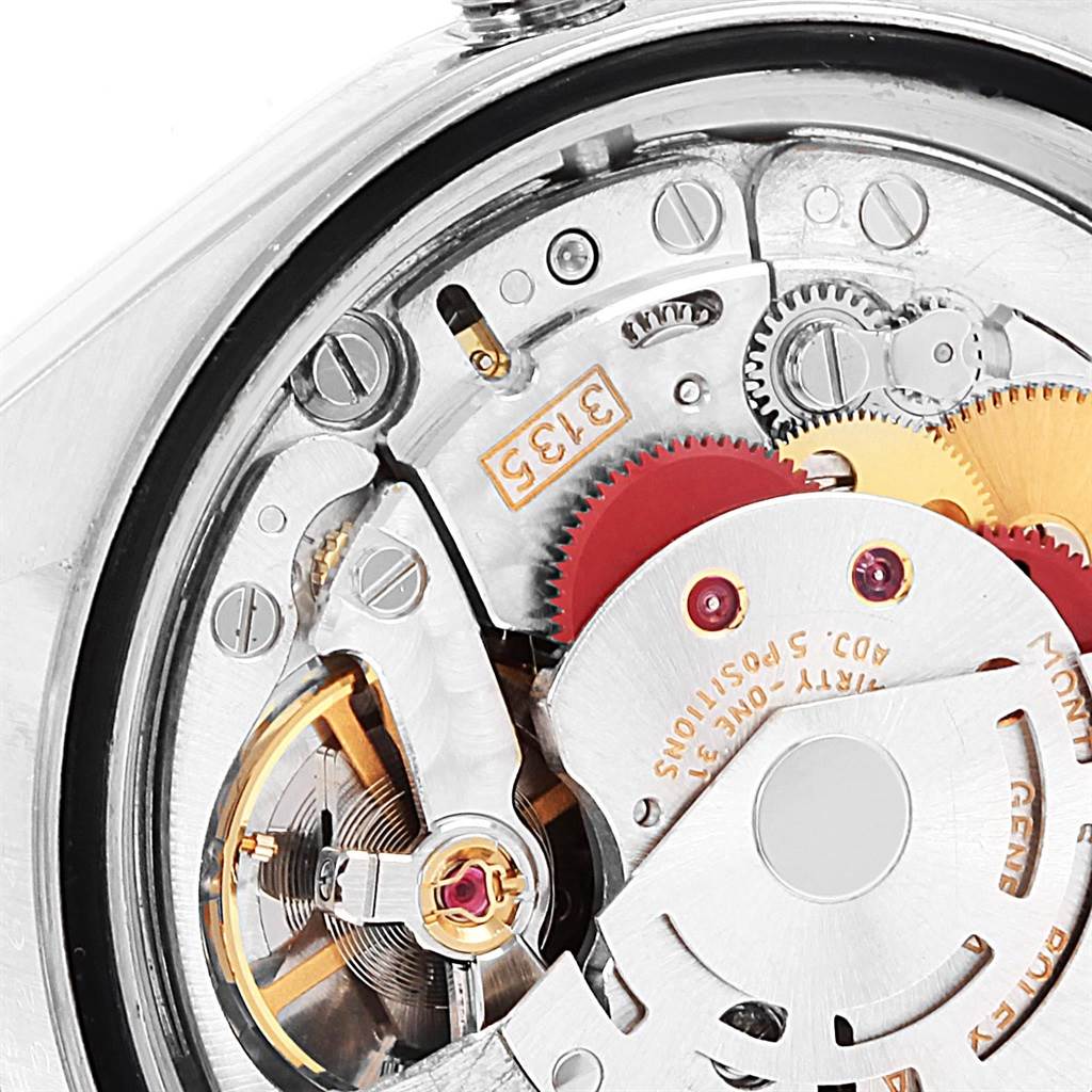 This image shows the intricate inner mechanism of a Rolex Datejust 16233 Men's Steel and Gold (two tone) Black Dial 16233 Men's Steel and Gold (two tone) Black Dial watch, taken from the back angle.